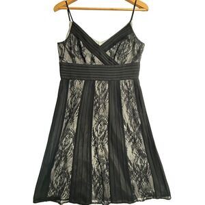 blue anemone dress Ruffled Organza Moon – SANDY NOUR The color doesn't matter category:Neutrals It is adorned with COLOR:BLACK/WHITE